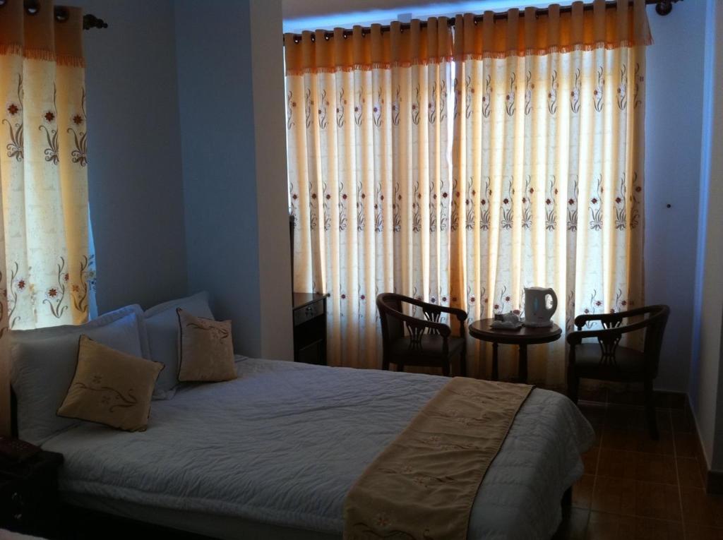 Minh Quan Hotel Bảo Lộc Phòng bức ảnh