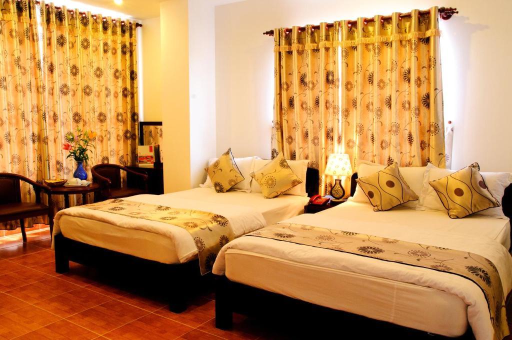 Minh Quan Hotel Bảo Lộc Phòng bức ảnh